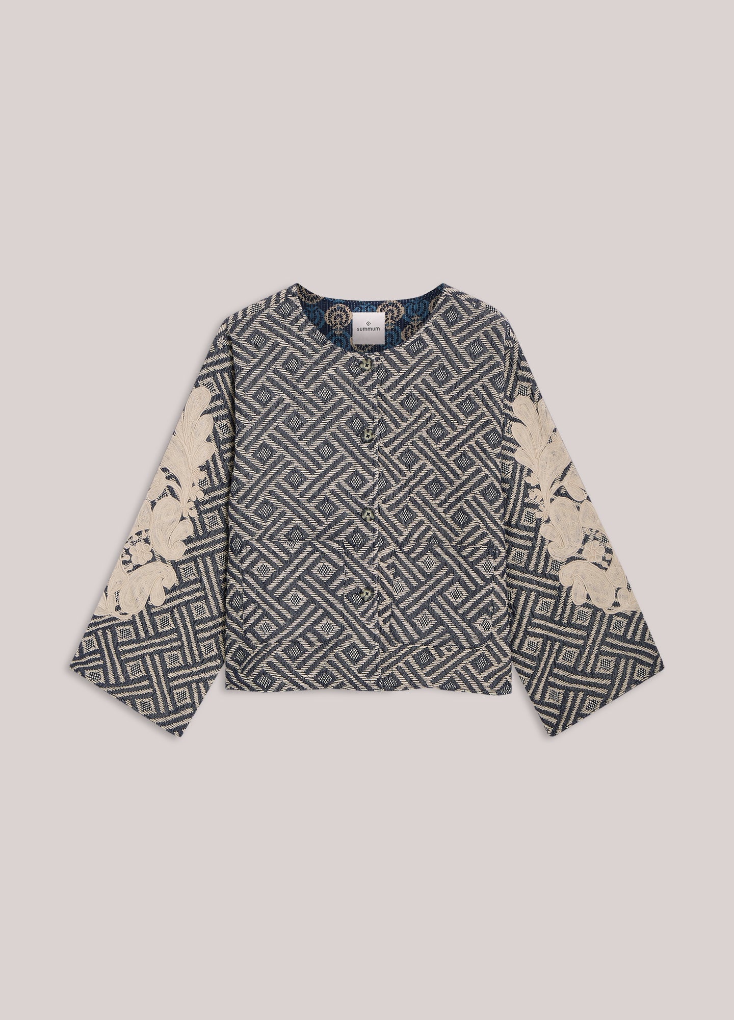 Reversible jasje met borduur