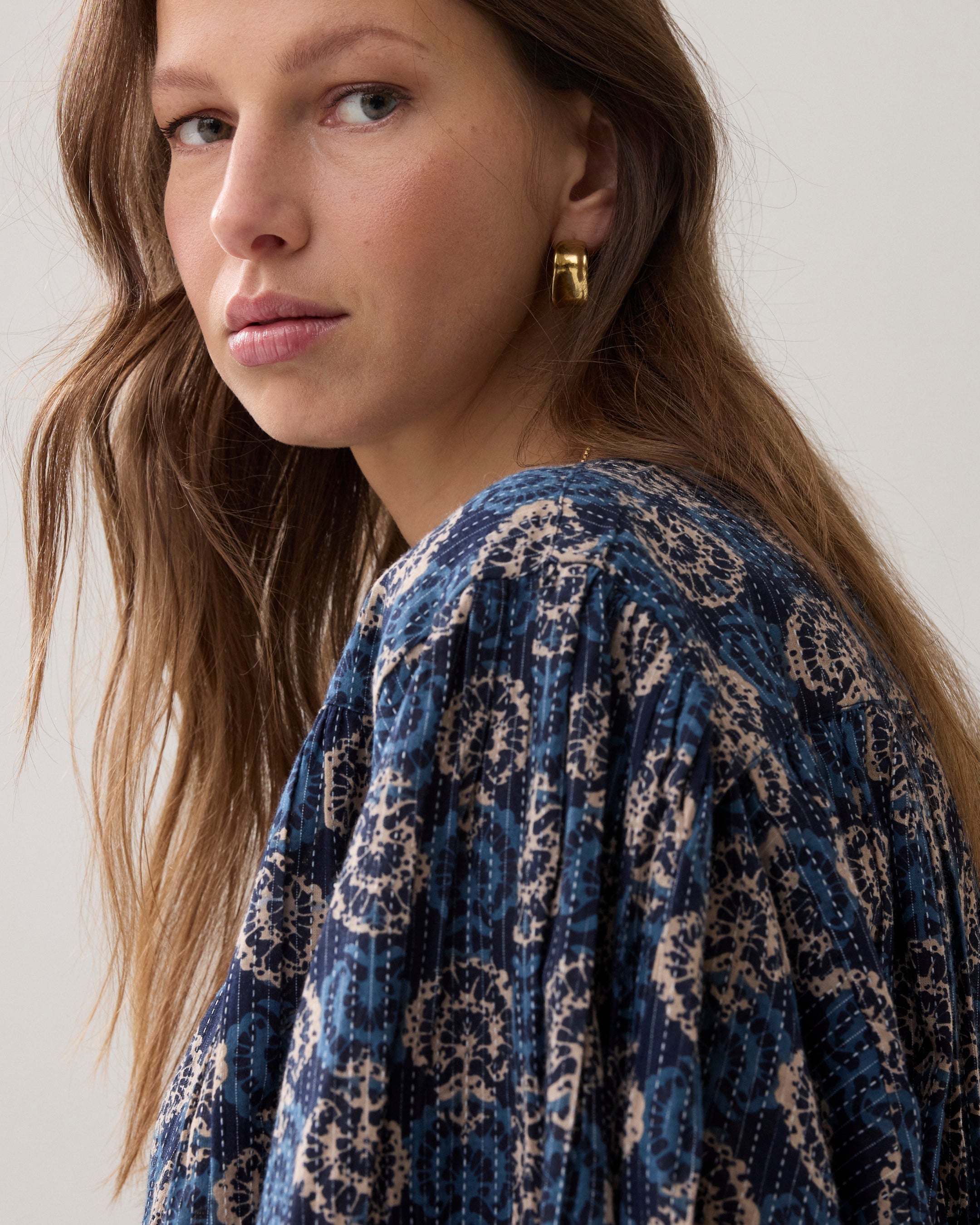 Blockprint-blouse met vleermuismouw