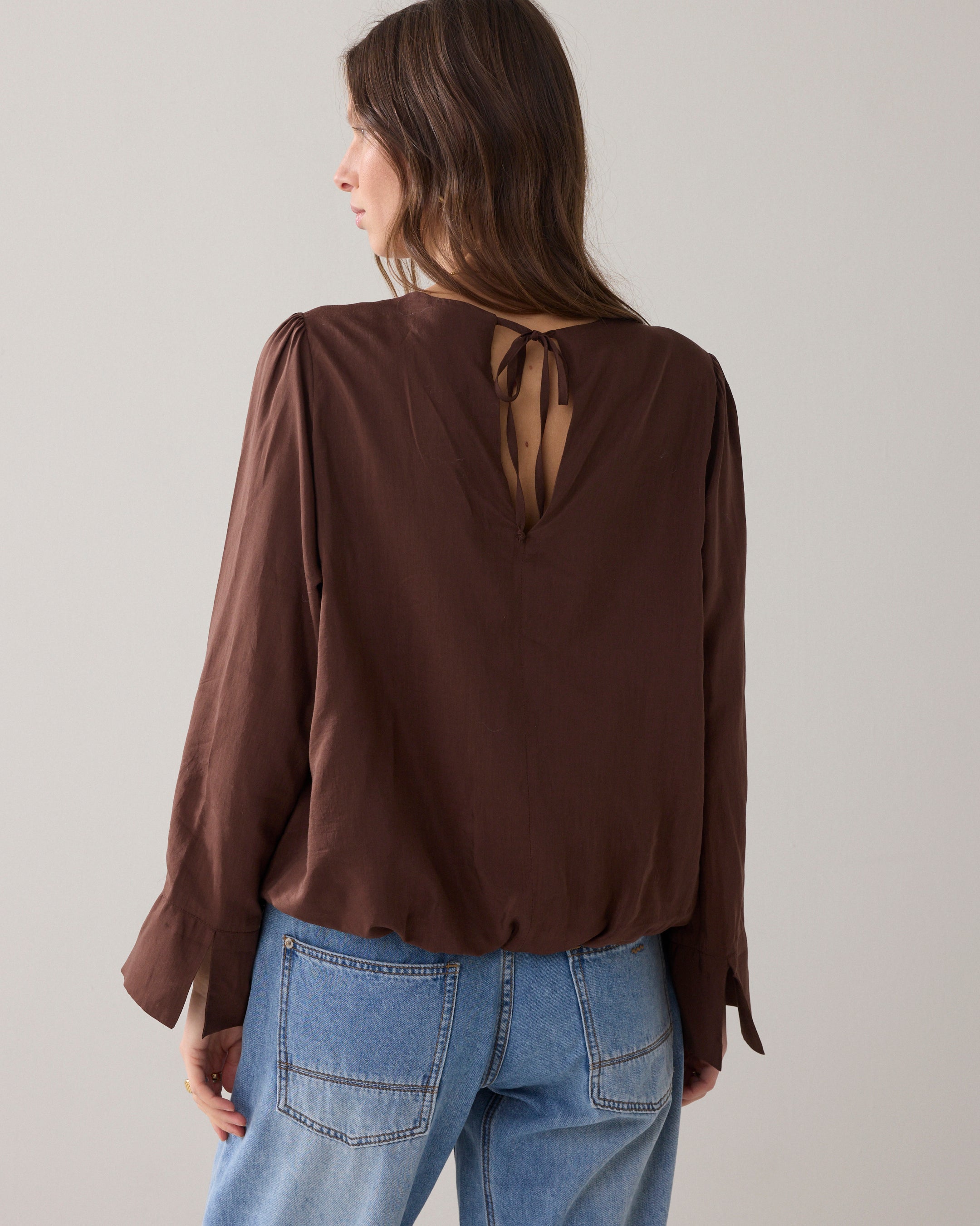 Geplooide top met glans